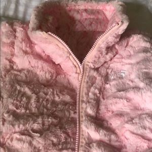North face girls pink fleece vest.  Reversible.